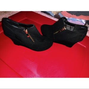 Black wedge booties